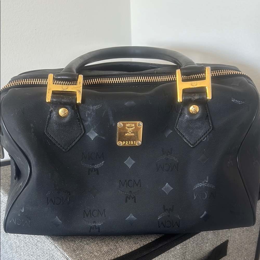 MCM Black Hobo Bag with Monogram Design